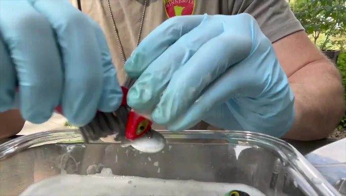 Remove all hardware (treble hooks, split rings, etc.)