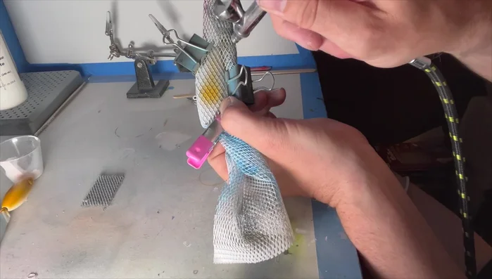 Apply a finishing coat and add details (eyes, etc.).