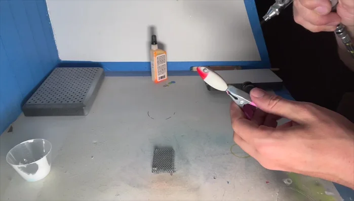 Apply a finishing coat and add details (eyes, etc.).