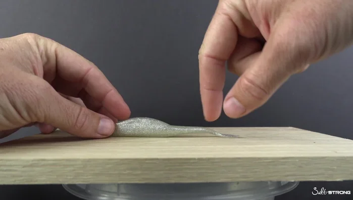 Observe until the plastic becomes malleable (about 1.5 minutes for a thin section).