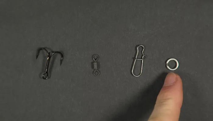 Screw in jig head into soft plastic lure.