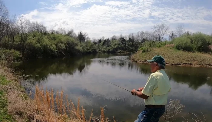 Vary retrieve speed and depth: Experiment with different retrieve speeds and depths to find what works best in different situations. The presenter shows stopping and letting the bait sink is effective.