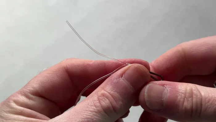 Trim the tag end of the Griner knot to be parallel with the rig body.