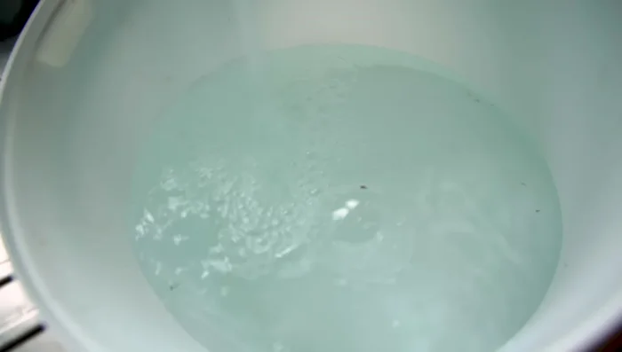 Thread the line backwards through the first eye of the fishing rod.