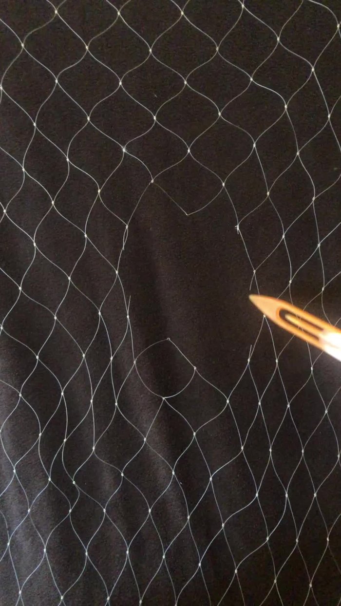 Trim away scraggly bits, leaving a basic hull.