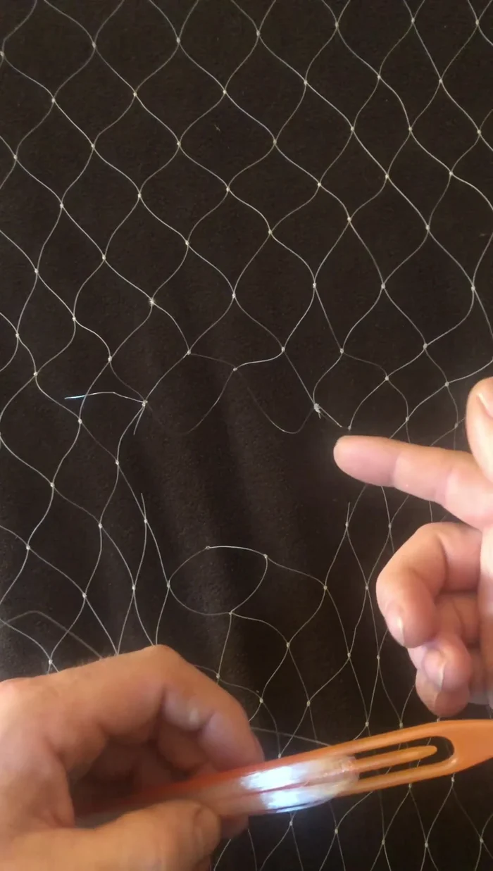 Cut off excess monofilament, leaving a half-inch tail to prevent fraying. Fold back the short end to make it stiffer.