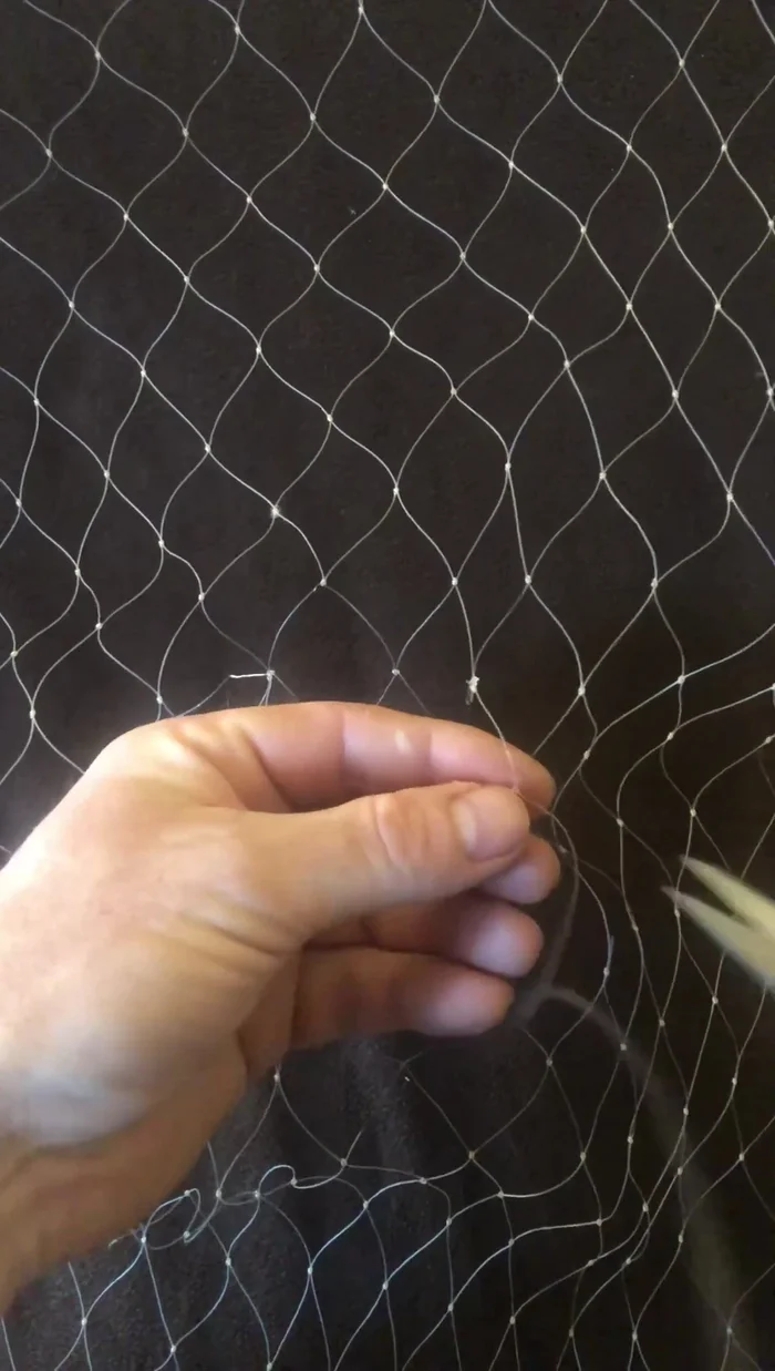 Cut off excess monofilament, leaving a half-inch tail.