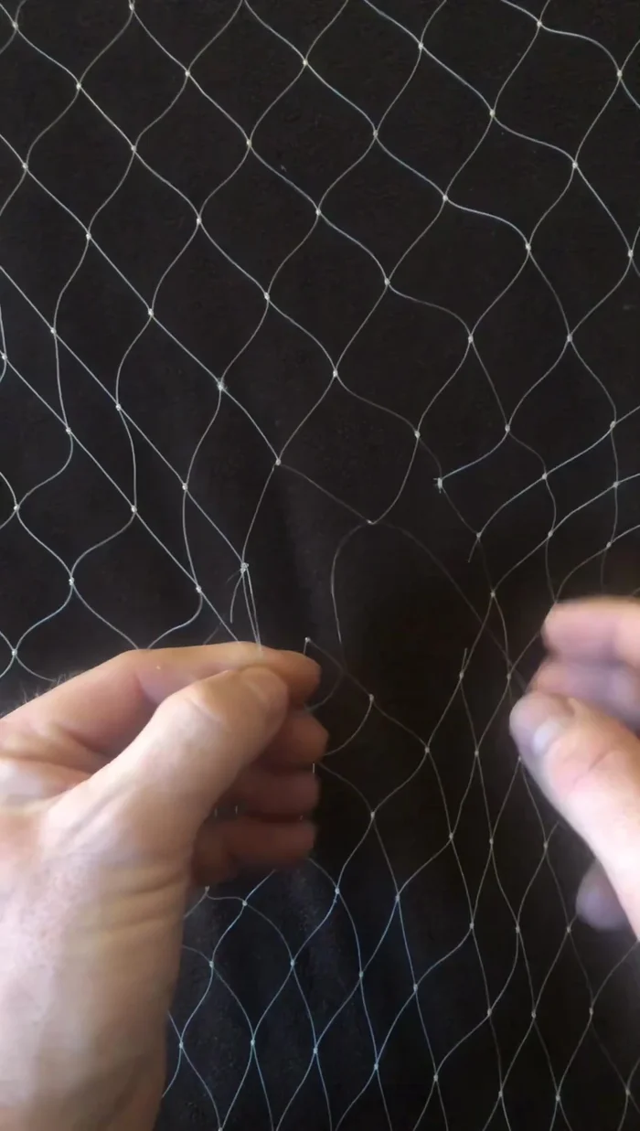 Complete the mesh repair by using the adjacent mesh as a guide to create new meshes, ensuring they are slightly larger than the original mesh to prevent distortion.