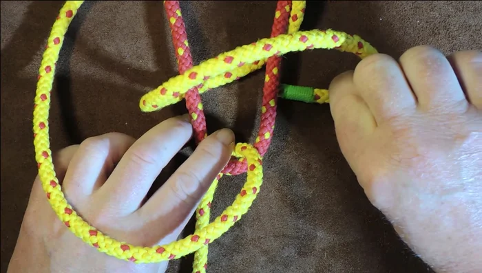 Pull it through to tighten.