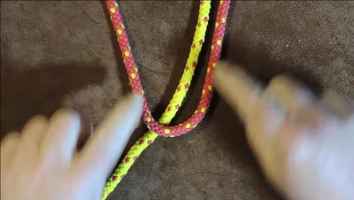 Pull it through to tighten.