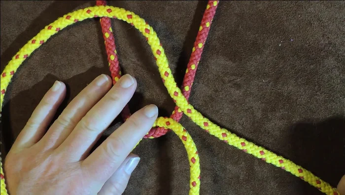 Pull it through to tighten.