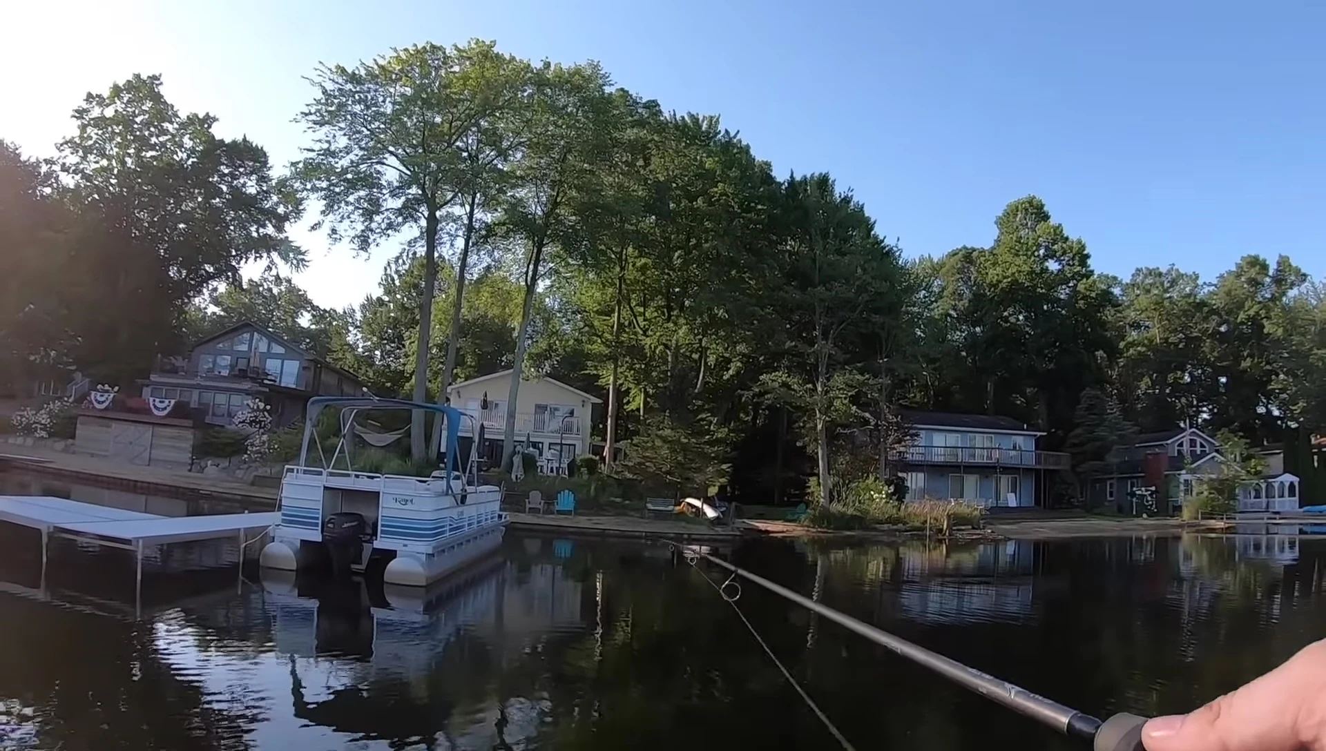 Angler reeling in the Booyah Prank Popper like a crankbait.