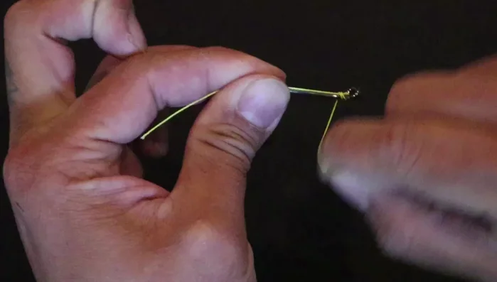 Wrap the tag end of the line around the standing line 7-10 times.