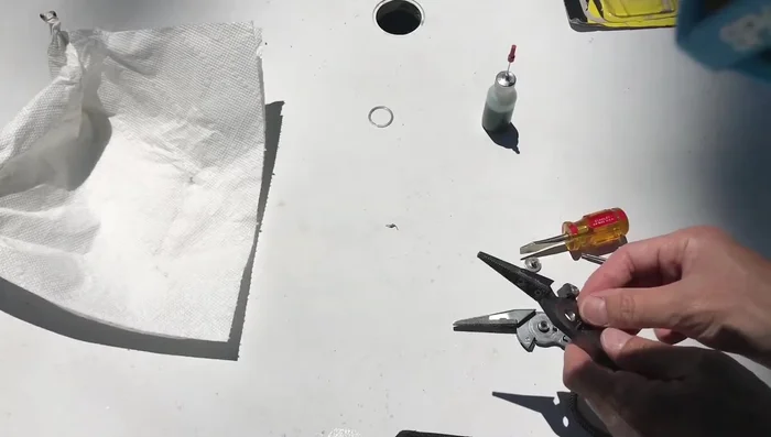 Tighten the set screw, leaving it slightly loose initially to allow for spring action.