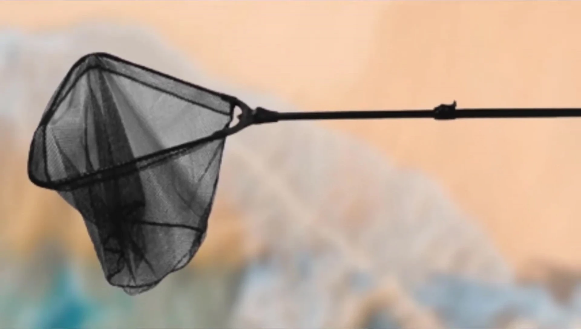 Demonstrating the ease of folding the Frabill net.