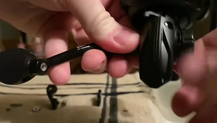Twist the remaining part to the left to open the reel.