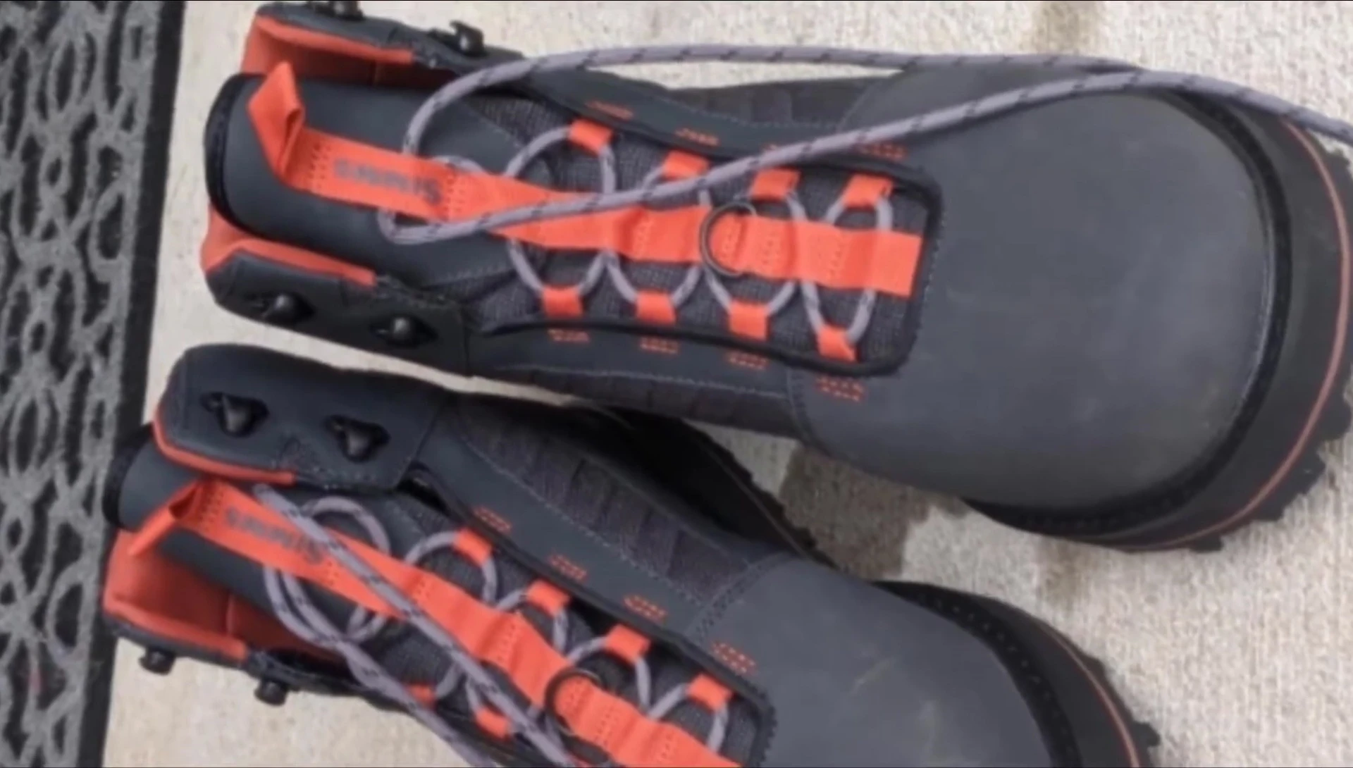 Close-up shot highlighting the durable construction of the Sims Tributary boots