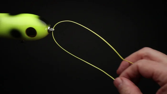 Pull through about eight to ten inches of line.