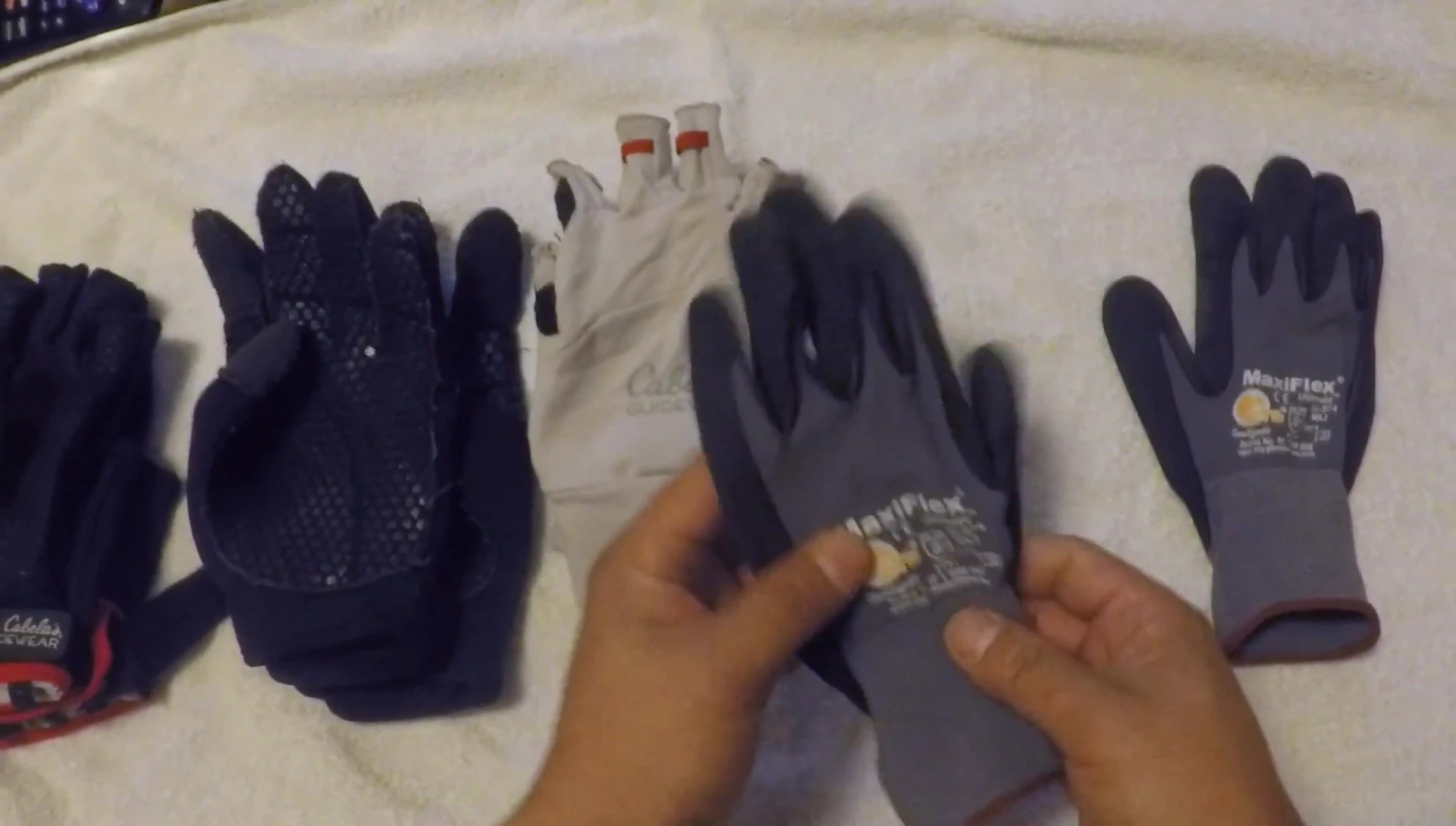The Maxiflex gloves shown in the speaker's hands