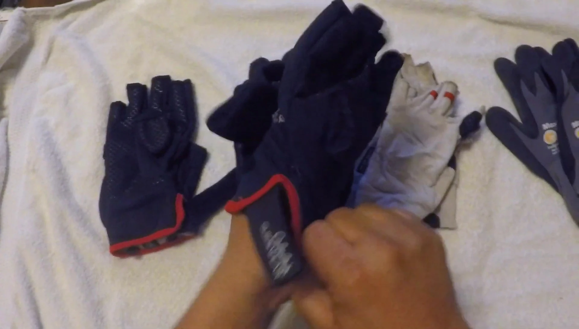 The gloves on the speaker's hands showing the mitten conversion.