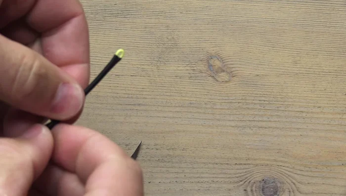 Carefully remove excess heat shrink tubing by peeling it away.