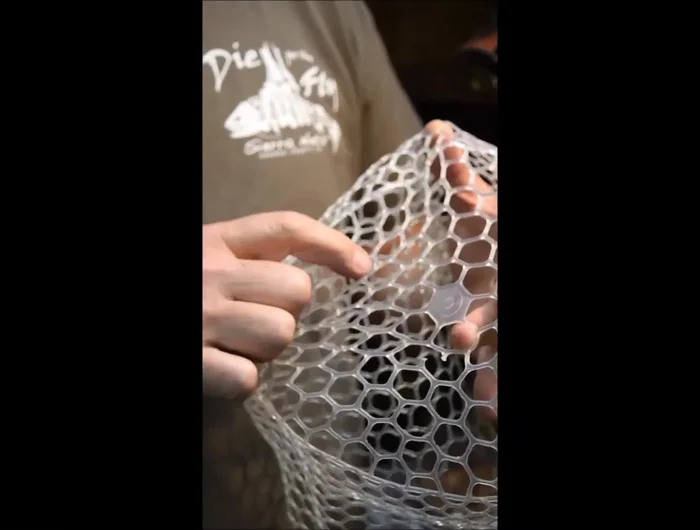 Inspect the repair. The joint should be strong and smooth, resembling the original net material.