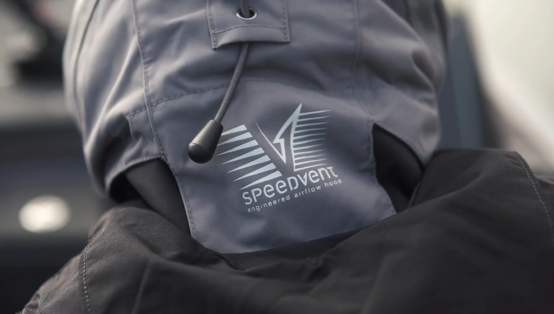 Jared Lintner showcasing the jacket's speed vent hood feature.