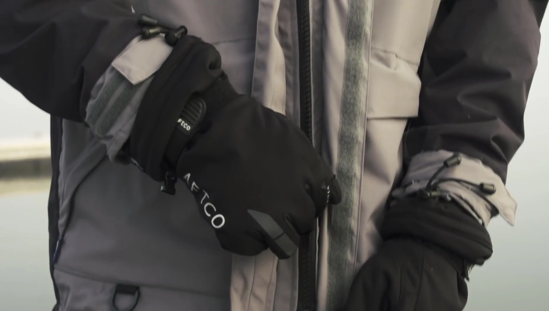 Close-up showing the jacket's heavy-duty zippers and cuffs.