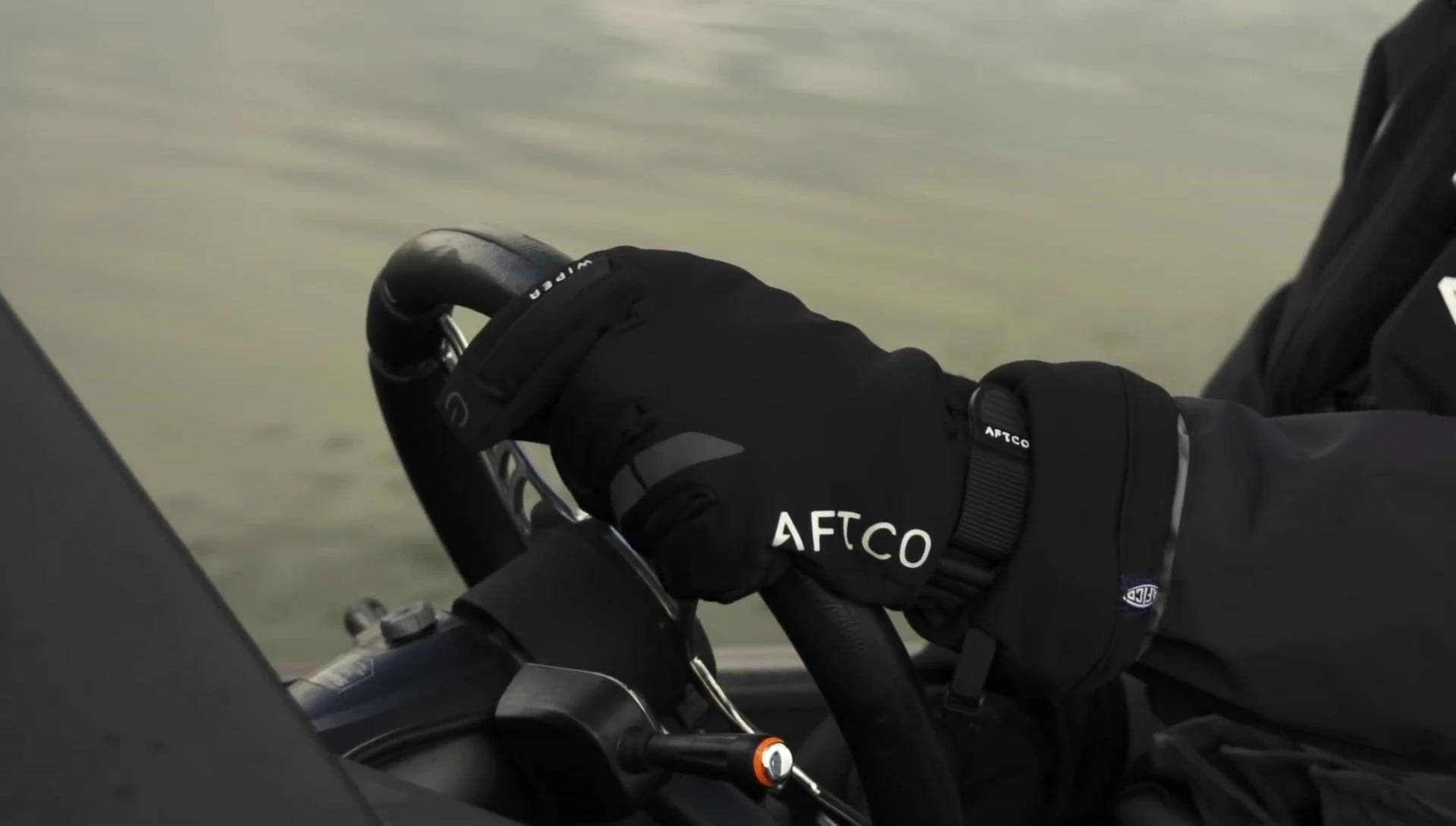 Detail showing the touchscreen compatibility of the gloves.