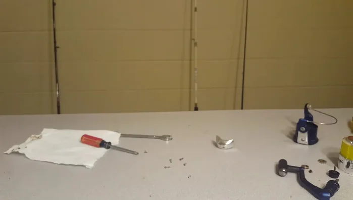 Reassemble the reel, ensuring all parts are properly tightened.