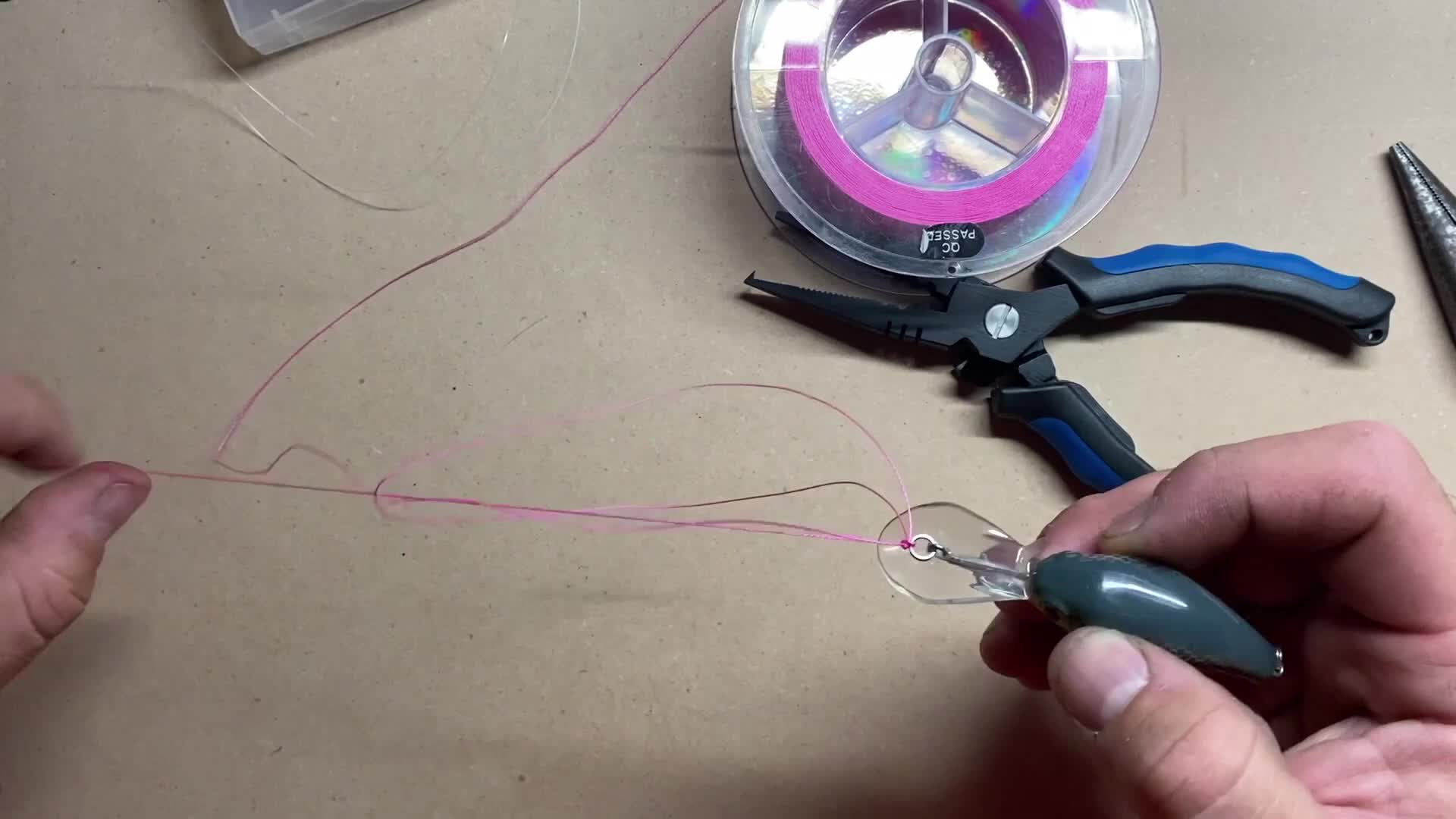 A close-up shot of various fishing pliers.