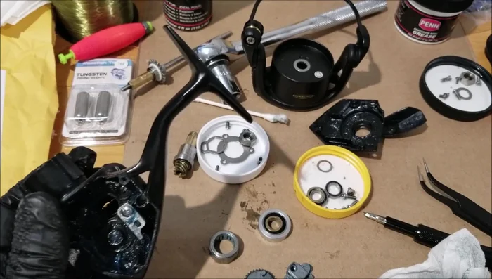 Reassemble the reel, tightening screws gradually and evenly. Ensure proper alignment of all parts.