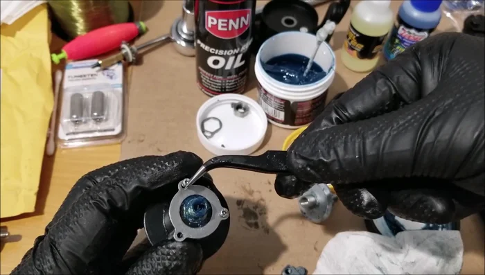 Reassemble the reel, tightening screws gradually and evenly. Ensure proper alignment of all parts.