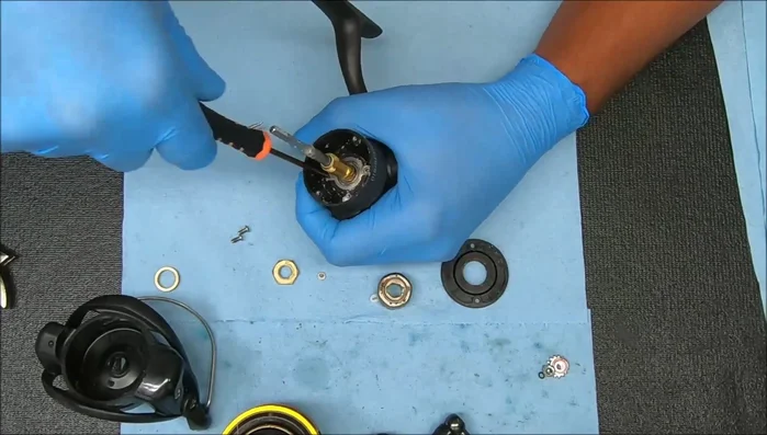Carefully open the reel to avoid damaging gears.