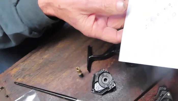 Install the anti-reverse clutch (teflon side down).