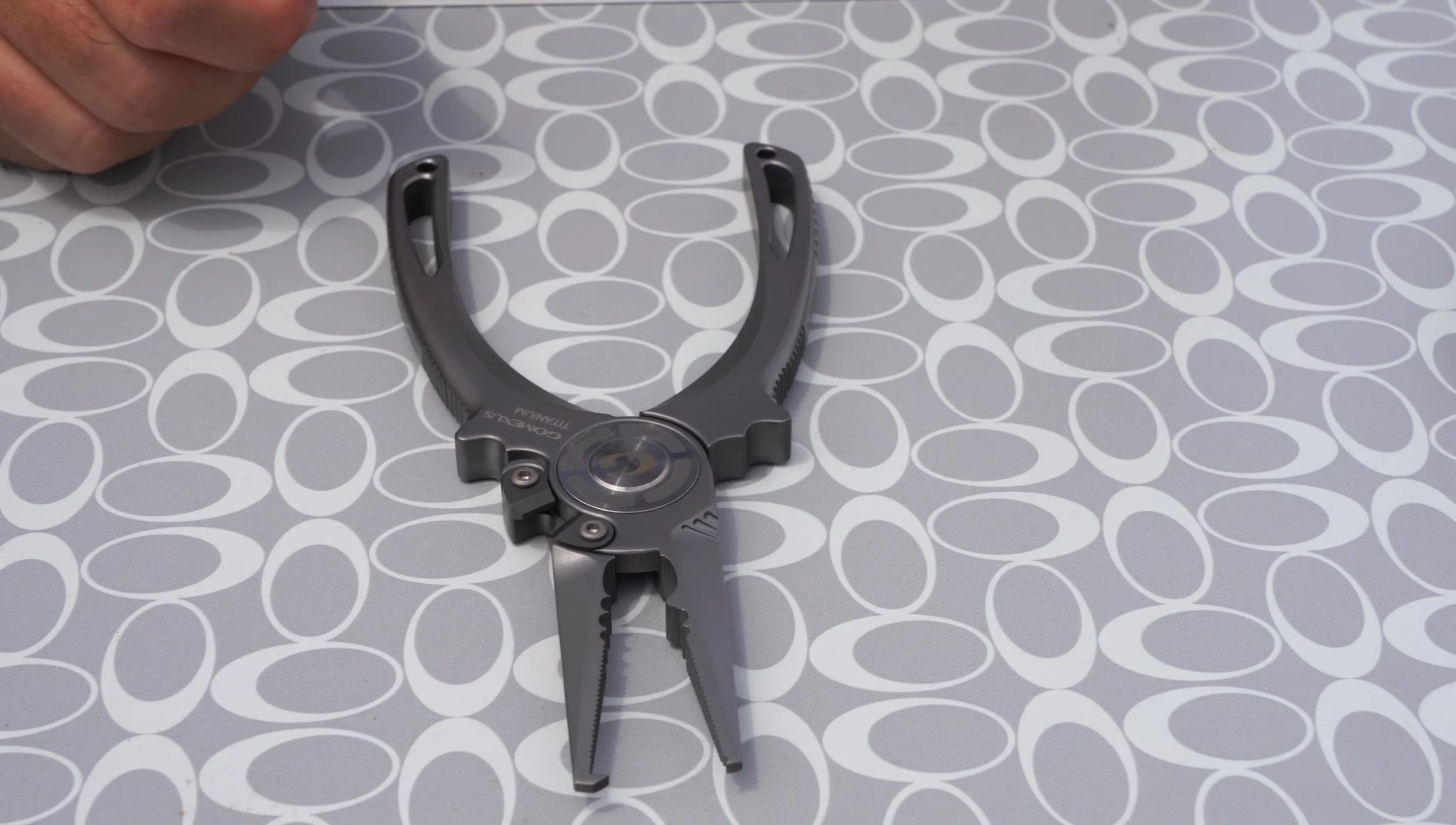 Detail showcasing the precision CNC machining of the pliers.