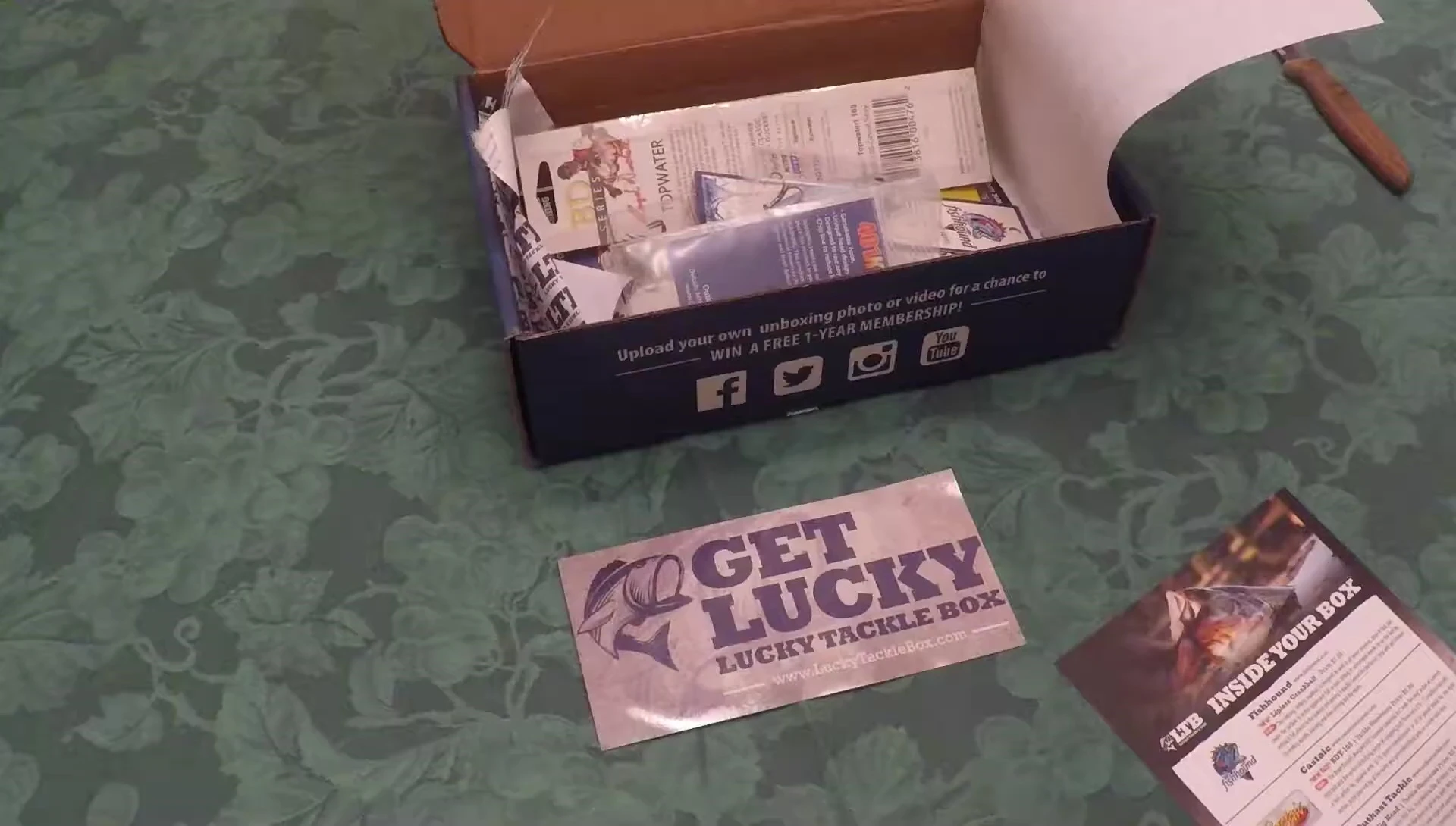 The Lucky Tackle Box card detailing the contents.