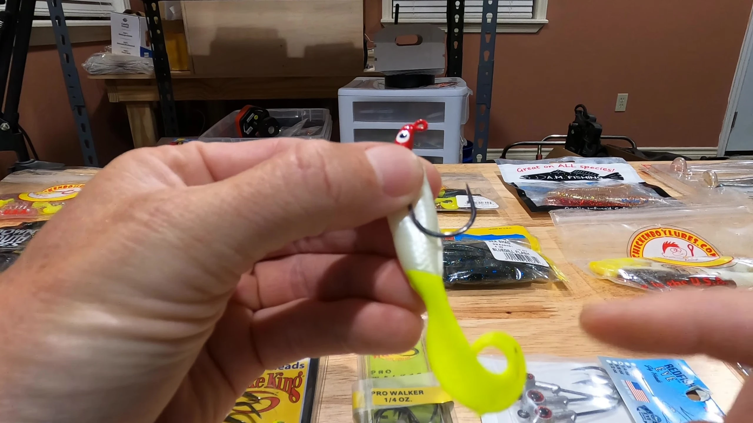 Speaker demonstrates how to properly rig the lure
