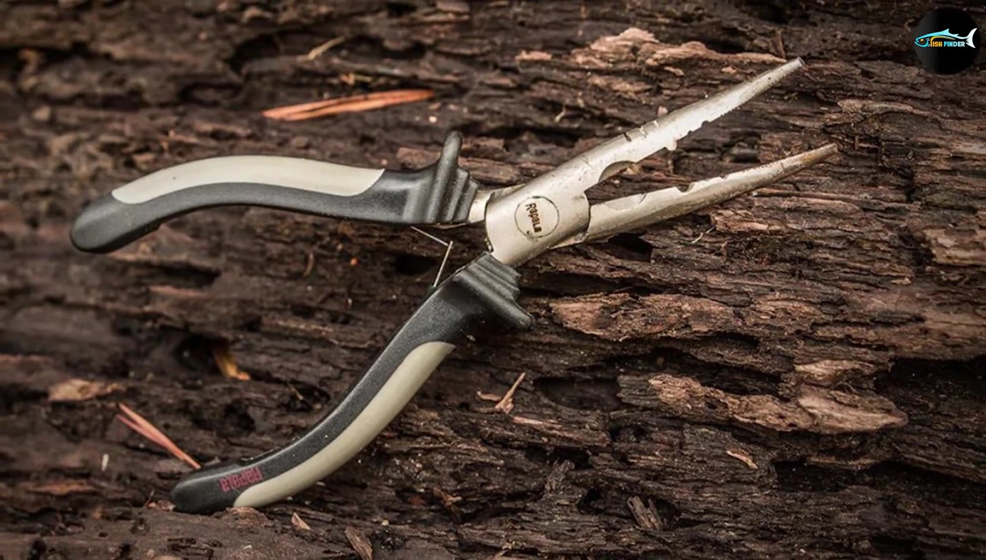 The pliers being used to remove a hook.