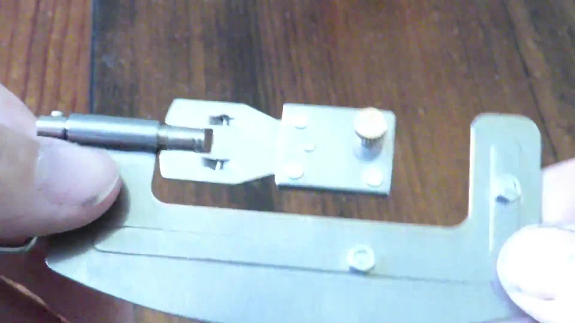 Close-up of the fish hook tying tool in its packaging.