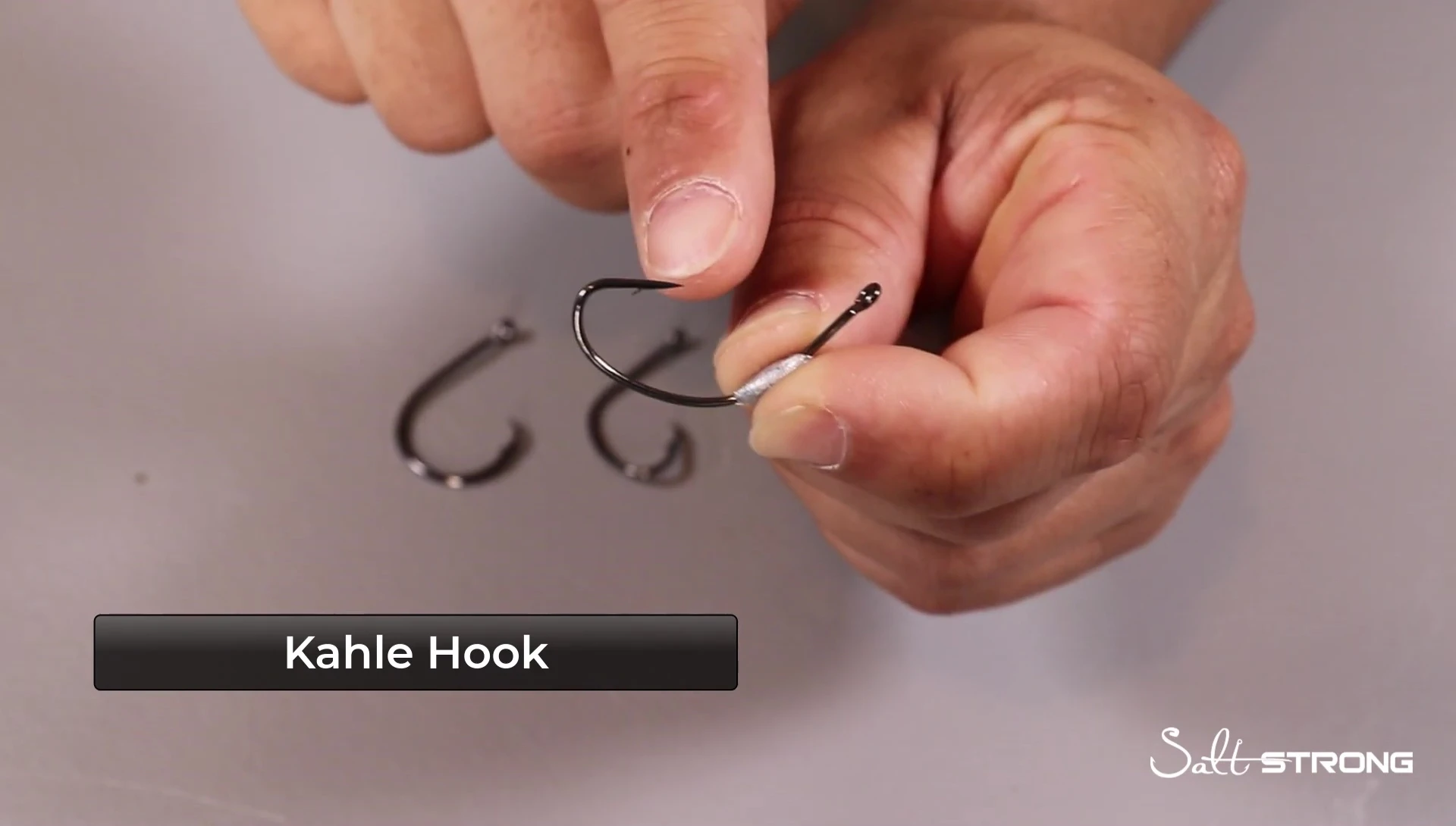 Kail hook being examined