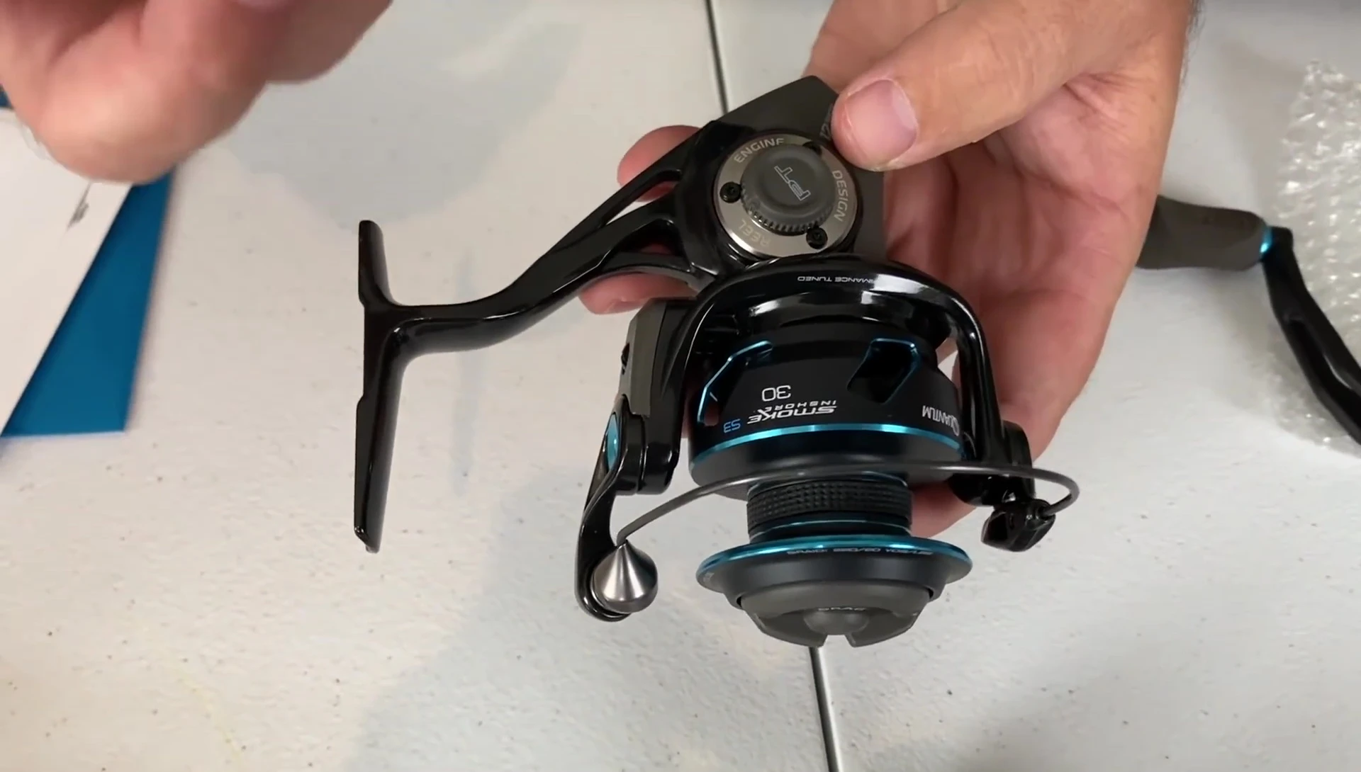 Close-up of the reel showcasing the one-piece frame and carbon rotor.