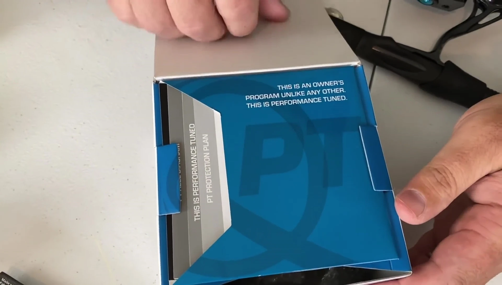 Unboxing the Quantum Smoke S3 reel, showing the contents.