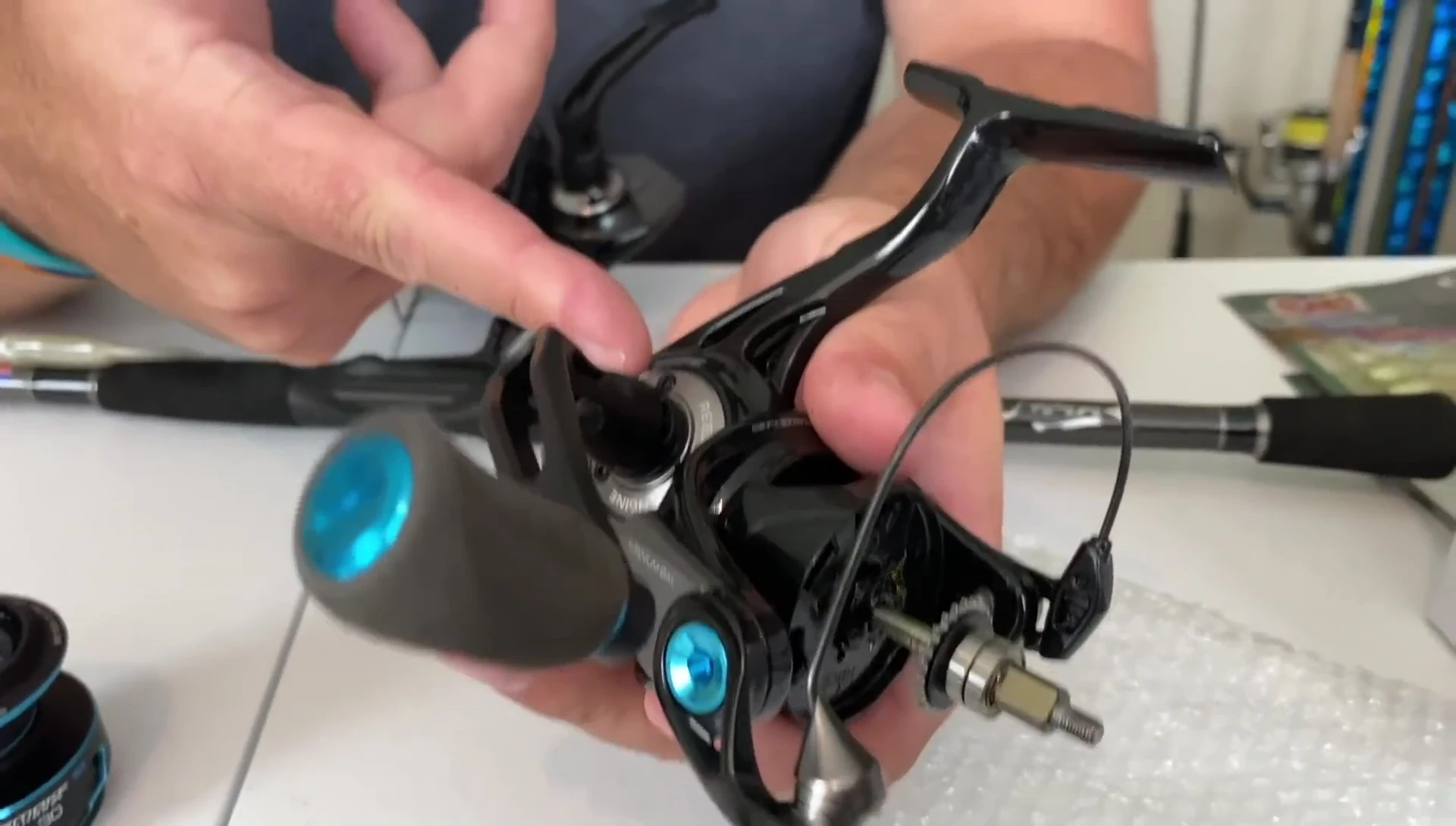 Close up of the reel's handle and gear system