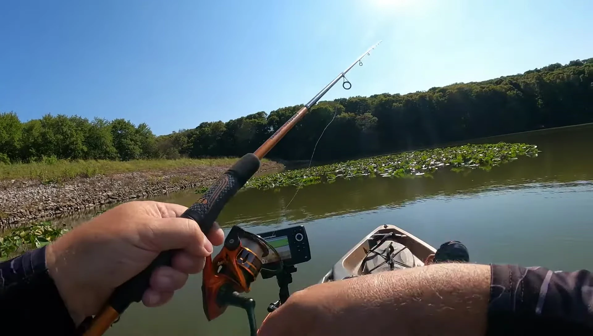 Close-up of the Lew's Mach Crush spinning rod, highlighting the IM8 blank and handle