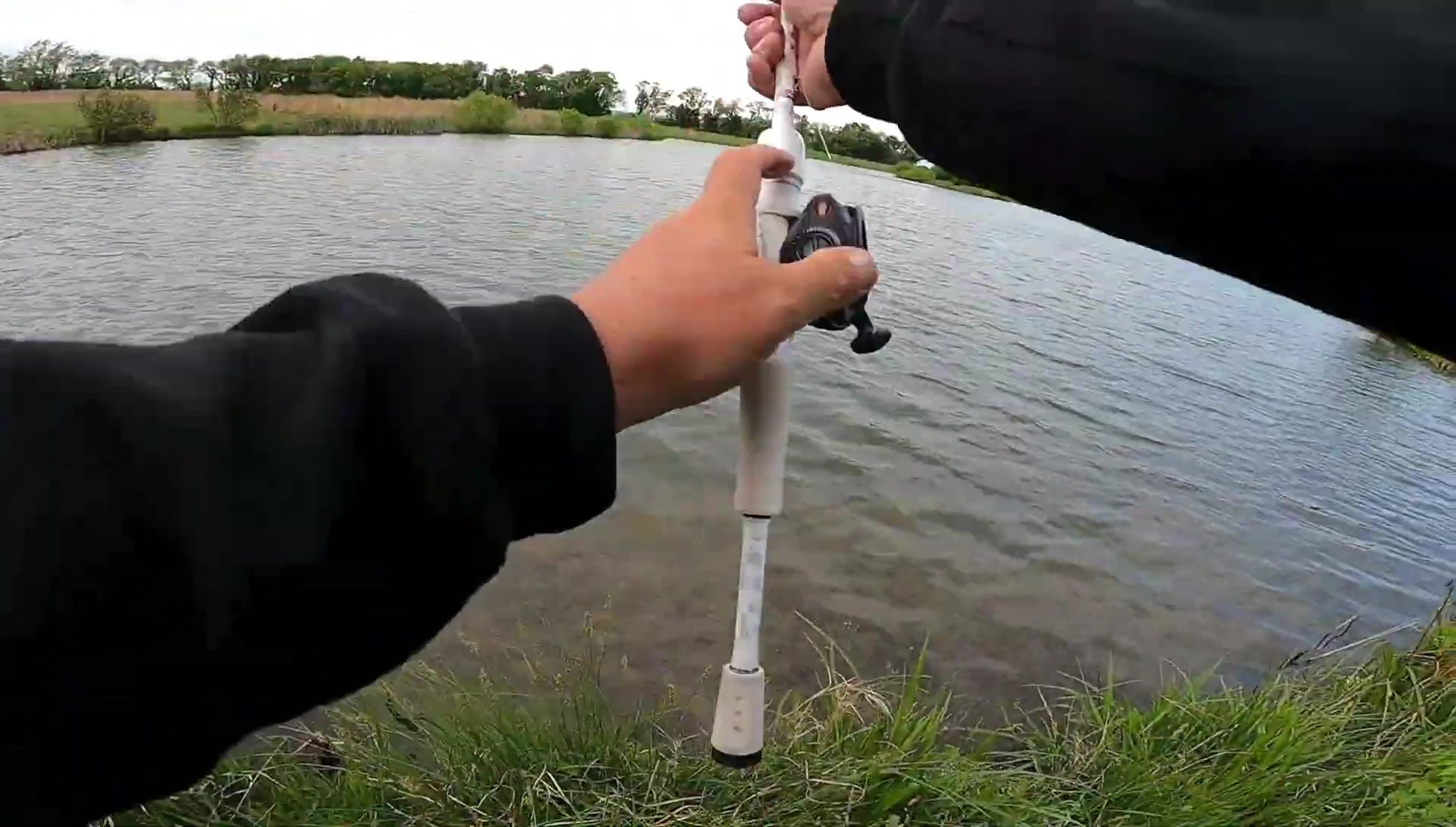 Fisherman adjusting the bobber stop