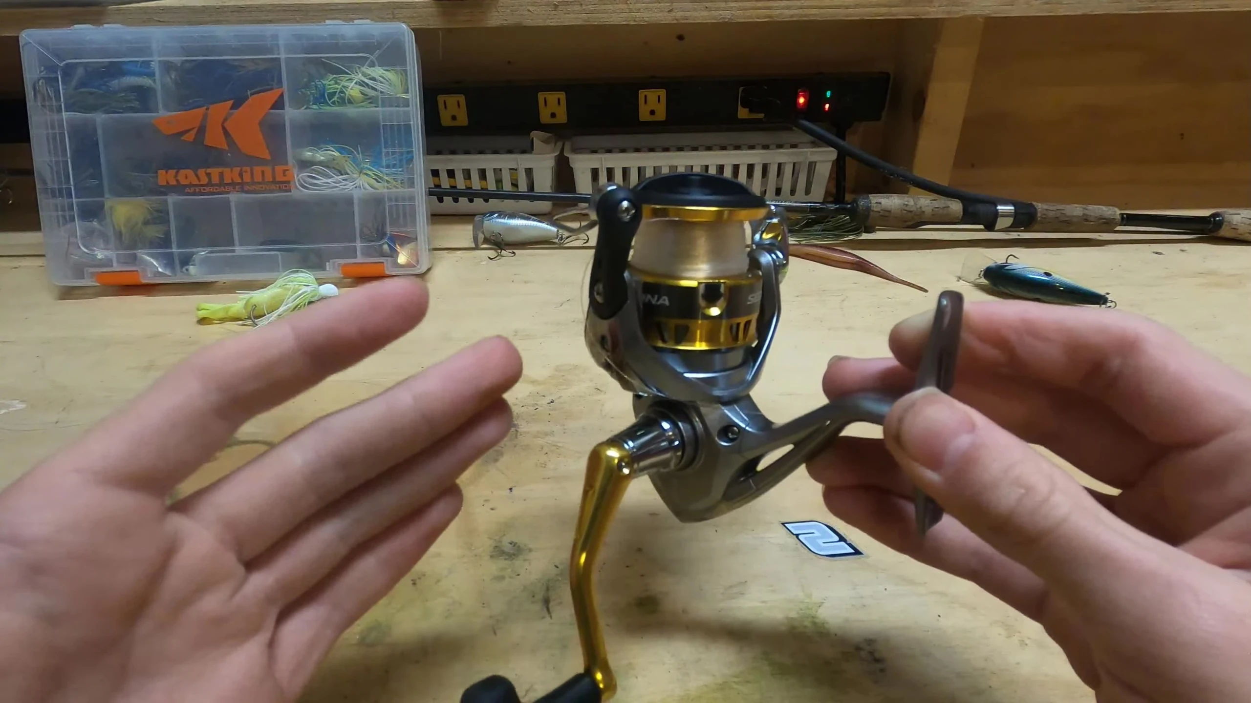 A comparison shot showcasing the price difference between this reel and high-end alternatives