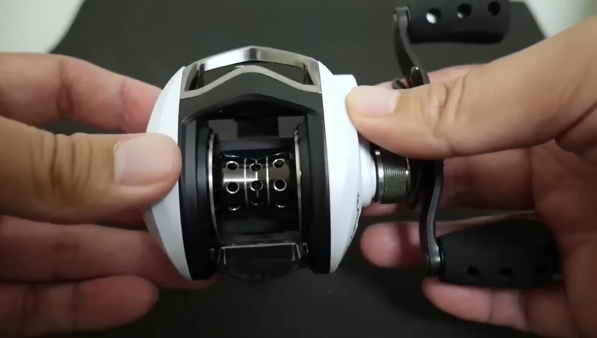 Close-up of the reel's aluminum frame and carbon side plates.