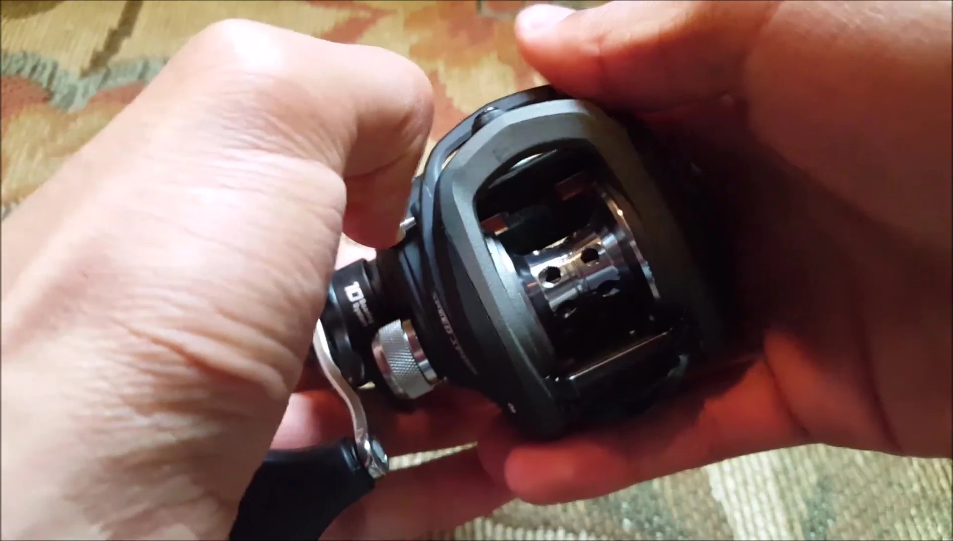 Demonstration of removing the sideplate for maintenance access.