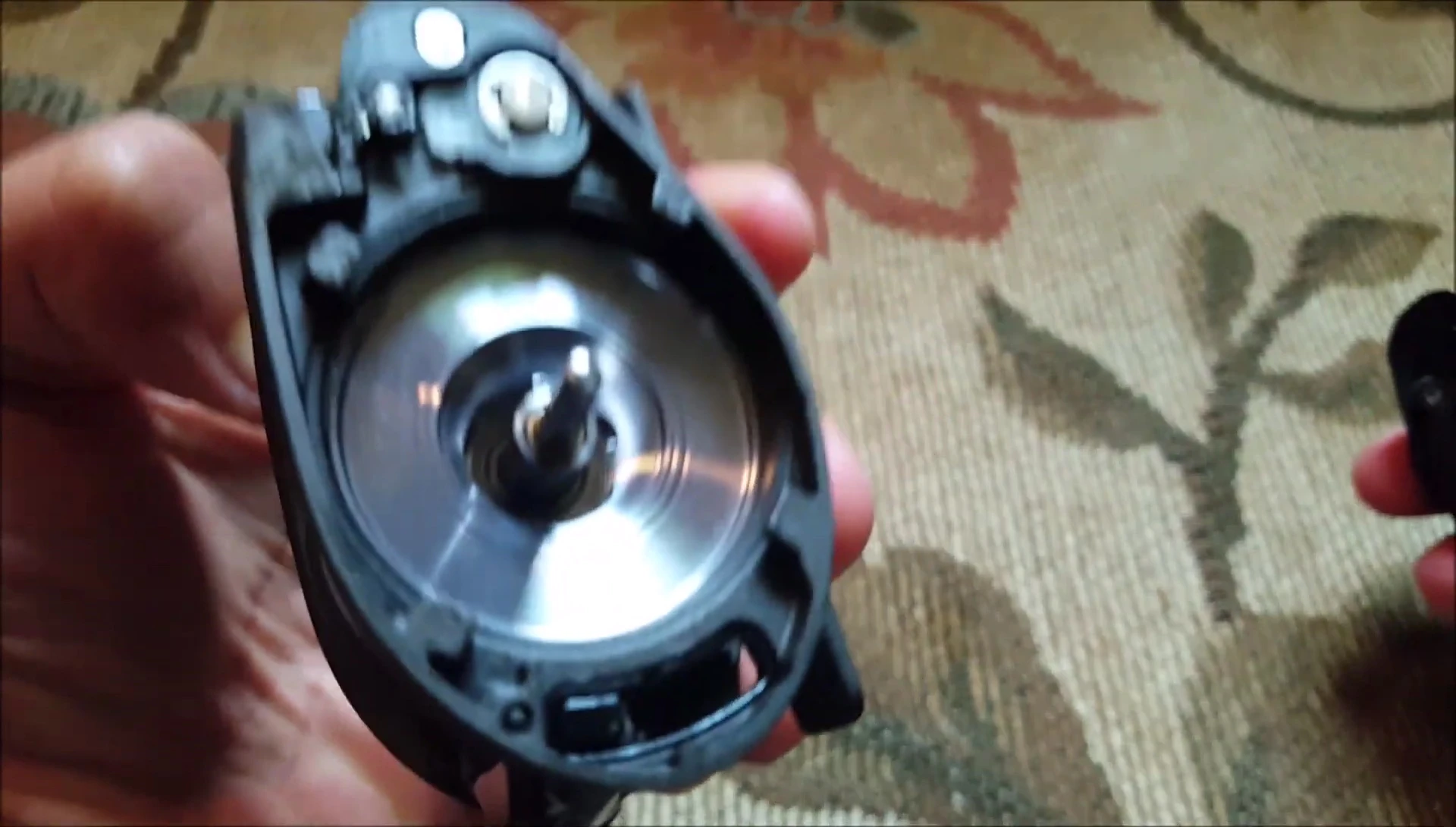 View of the internal components after removing the sideplate.